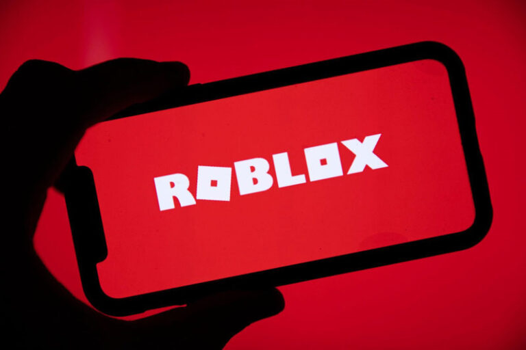 Roblox on a phone with red background